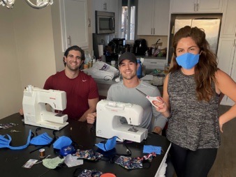 Mesa College Fashion alum Carmen Flores along with AP Nist and Kevin Gemmell of the 5,000 Mask Challenge