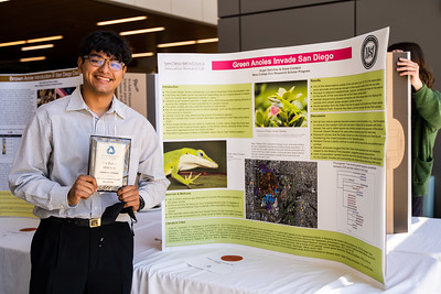 student presenting at a biology fair